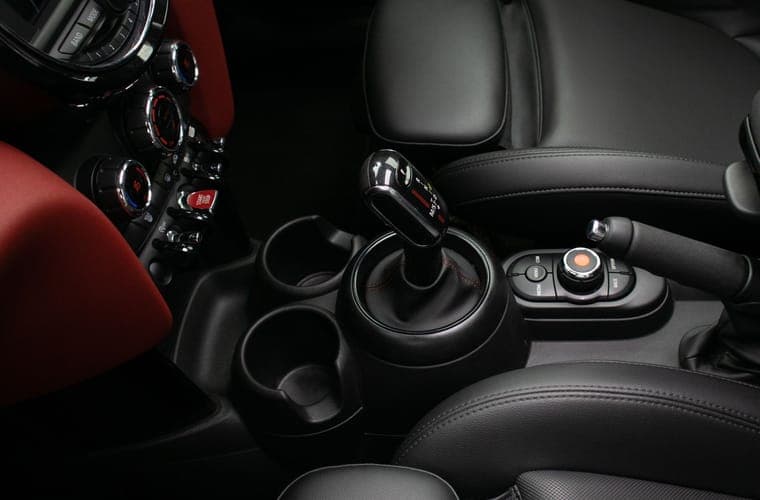 Car center console with cup holders and control buttons