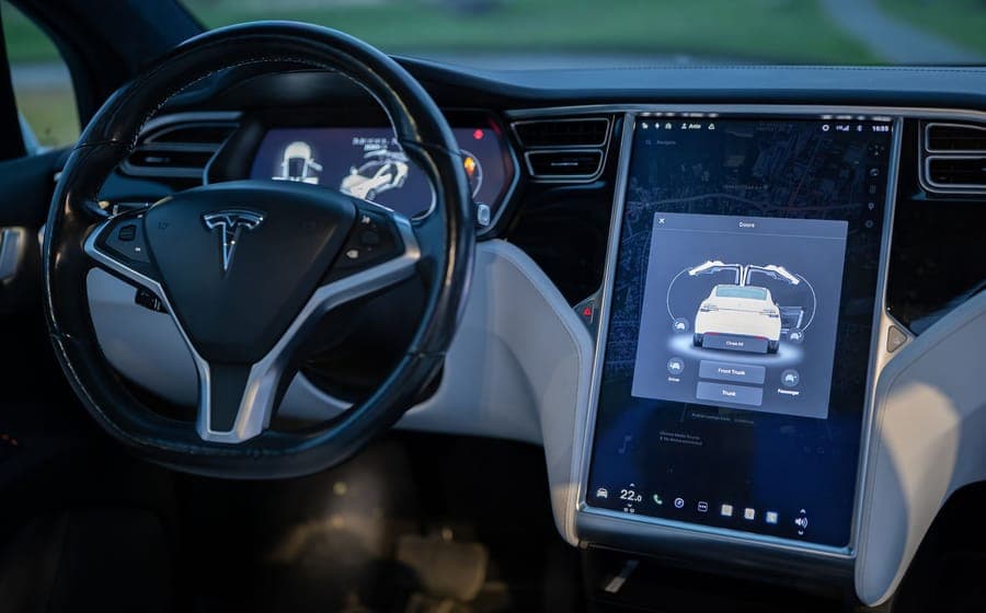 Electric-car cabin with the center touchscreen in the middle of the frame